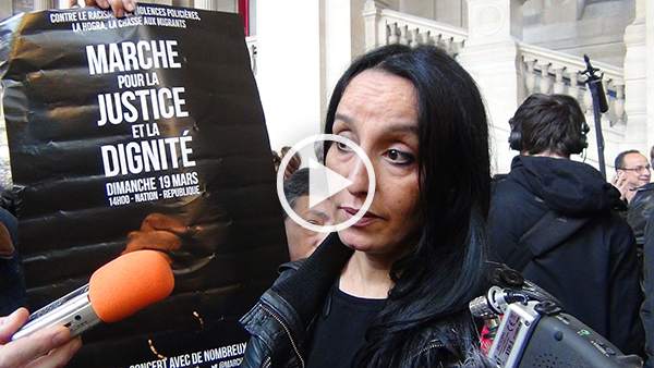 Amal Bentounsi répond aux journalistes, lors du procès du policier qui a tué son frère